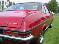 Rear view of maroon Magnum coupe